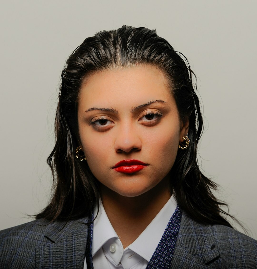 Professional Slovenian woman in business attire smiling confidently
