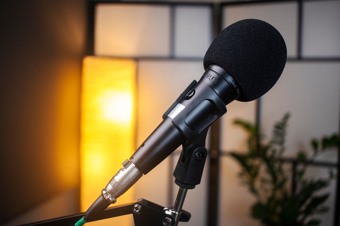 Professional microphone in a recording studio with soft lighting